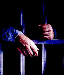man_behind_bars