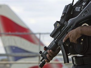 british_police_holding_gun